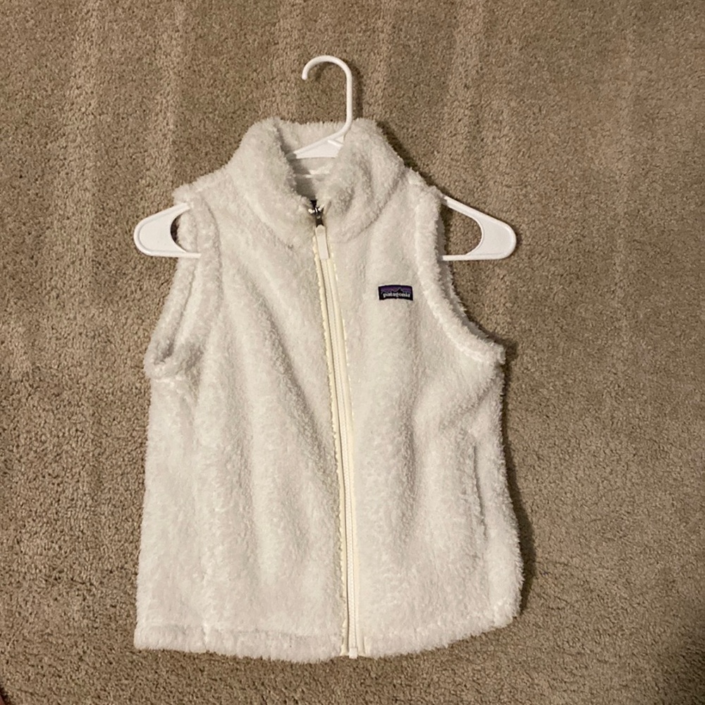 I am selling a white Patagonia vest